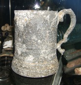 very old glass bottomed pewter tankard